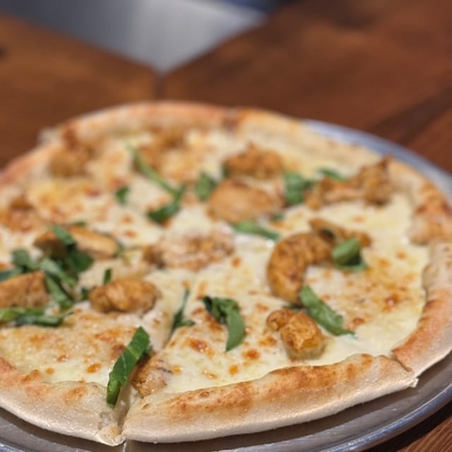 Spinach Alfredo Pizza.